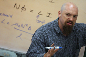 At Palisades High, David Schalek teaches his honors physics class about Huygens' Principle.